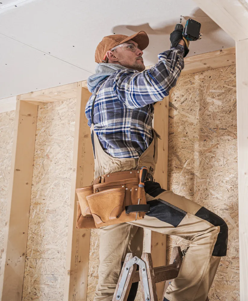 Addition Los Angeles team member building a home addition with framing and structural work in progress