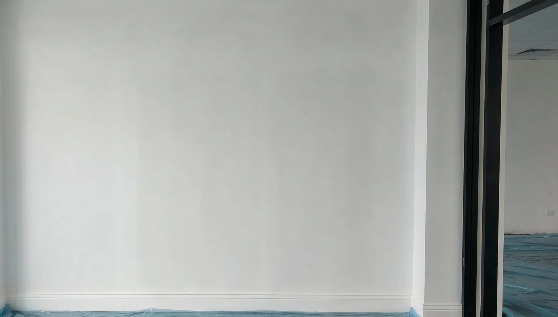 Completed commercial interior with smooth finished drywall