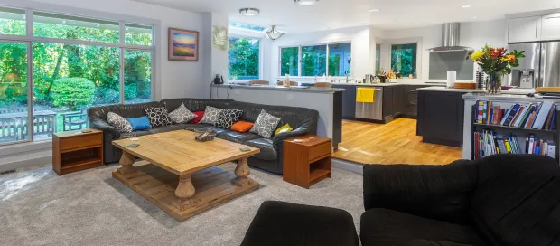 Finished kitchen with hardwood flooring and modern design
