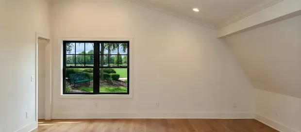 Completed second-story interior with fresh finishes and wood flooring