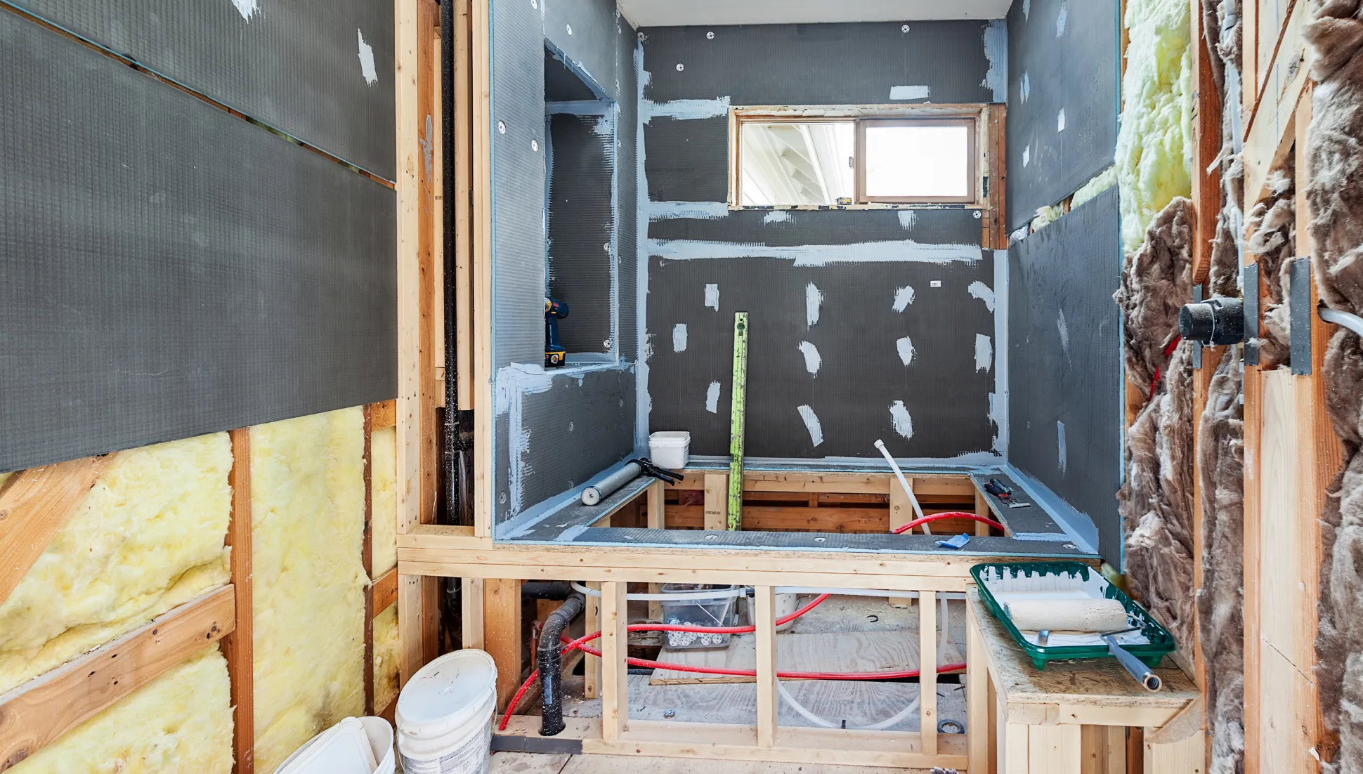 Bathroom addition construction with new walls, plumbing, and waterproofing installation in Los Angeles