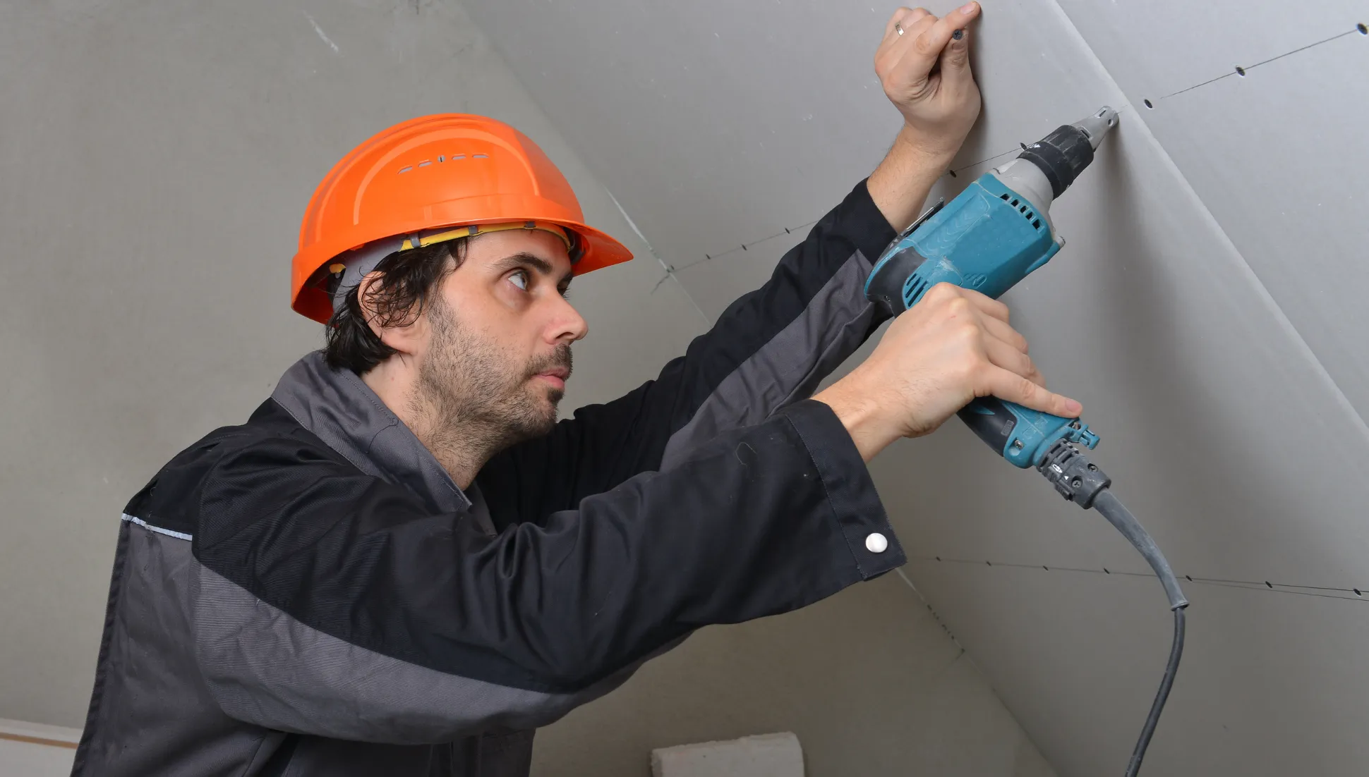 Contractor installing framing during a second-story home addition project in Los Angeles